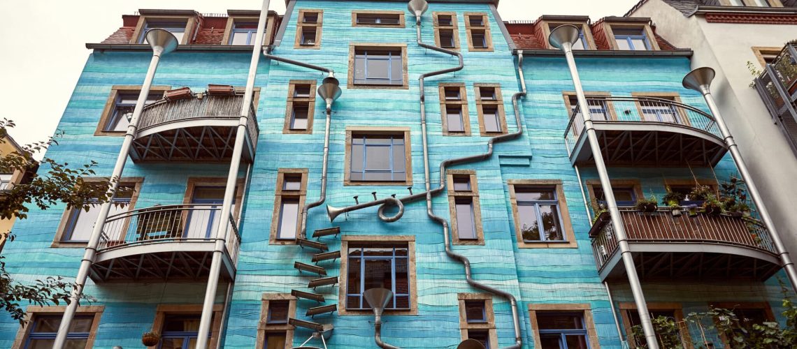 GERMANY, DRESDEN - 26 JUNE 2018: low angle view of modern blue funnel wall in kunsthofpassage